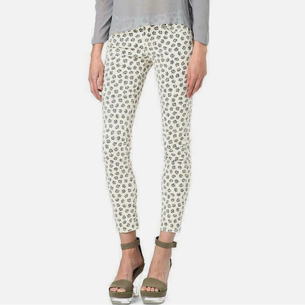 Paige Skyline Ankle Peg Skinny Jeans in Cream with Black Roses